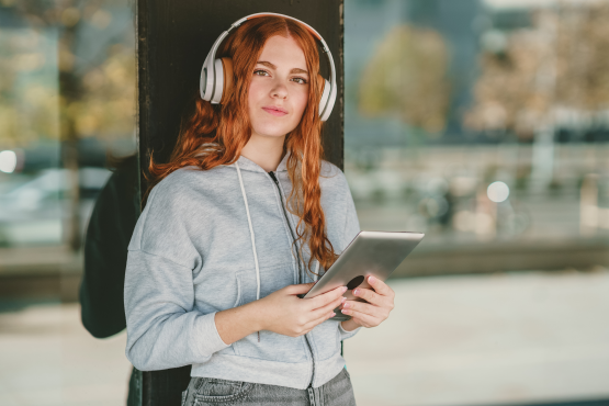 A young person wearing headphones